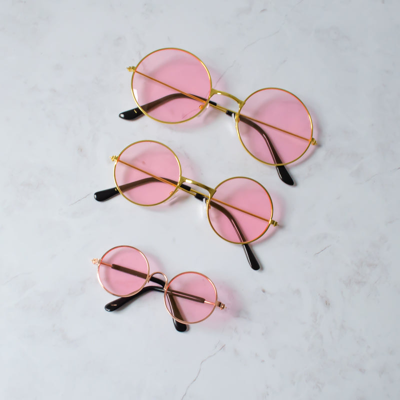 Dog sunglasses with pink lenses and rose and yellow gold frame