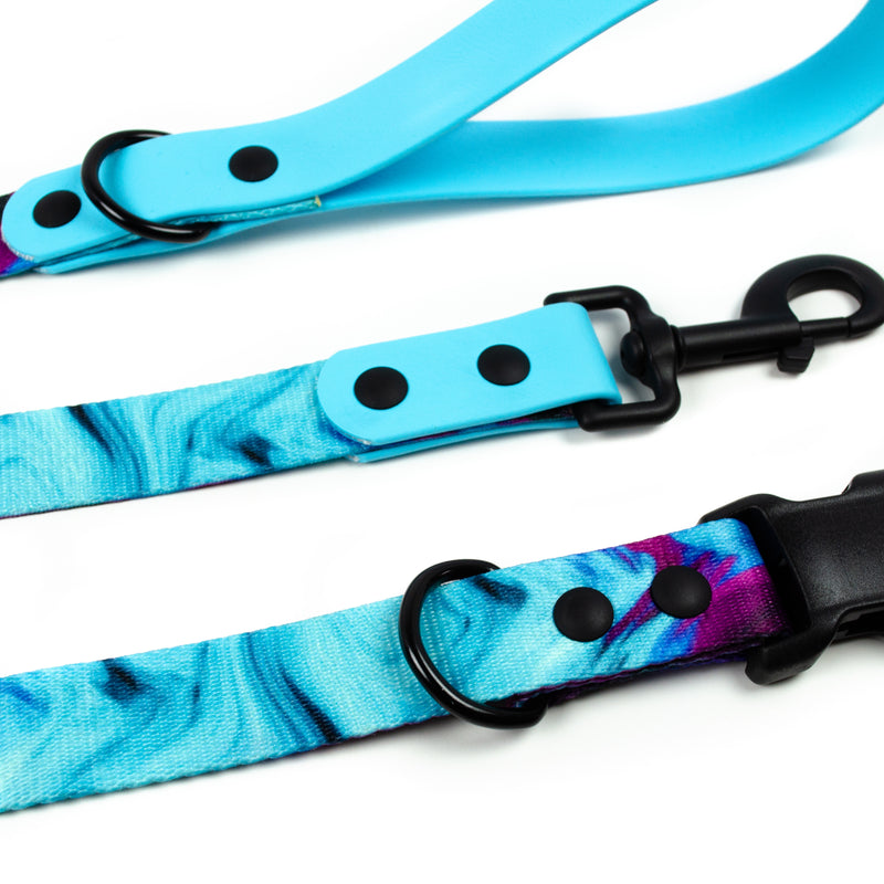 blue and purple tie dye dog collar and leash with matte black metal, solid brass hardware and blue biothane