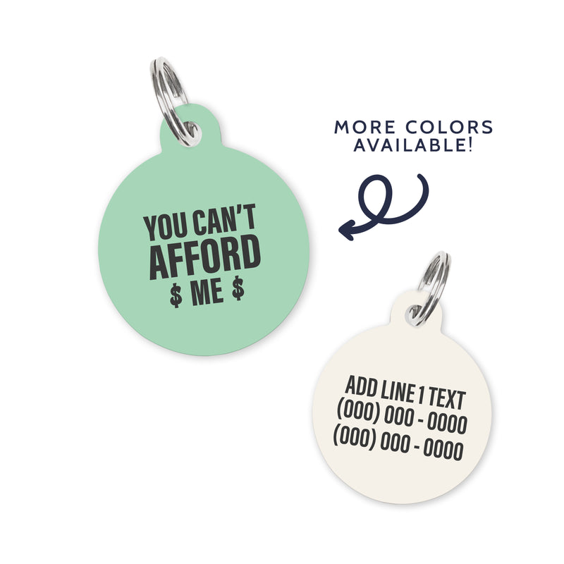 A light green colored dog ID Tag with white text stating a funny quote: you can't afford $ me $